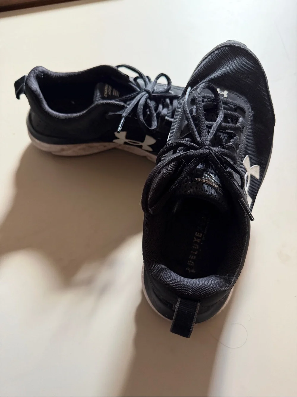 Under Armour Women's Charged Assert Athletic Sneakers